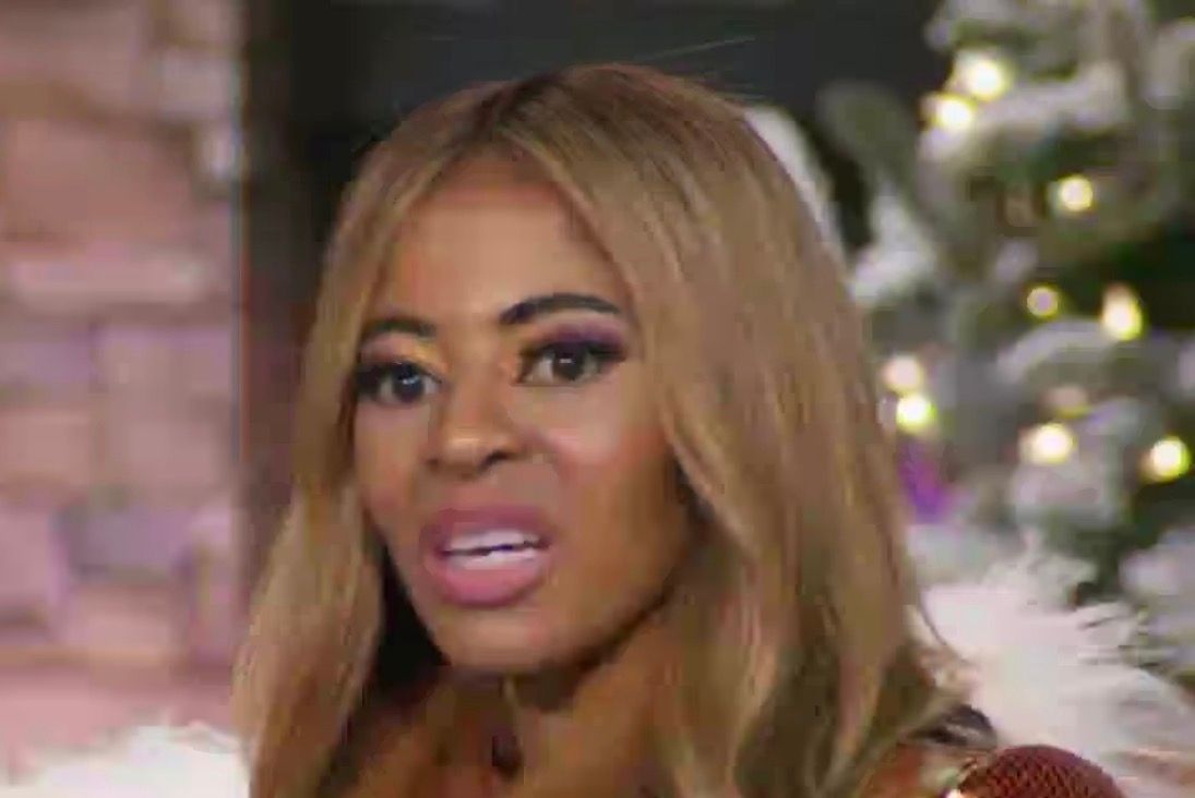 Christmas tree quietly judging her louder than Bravo