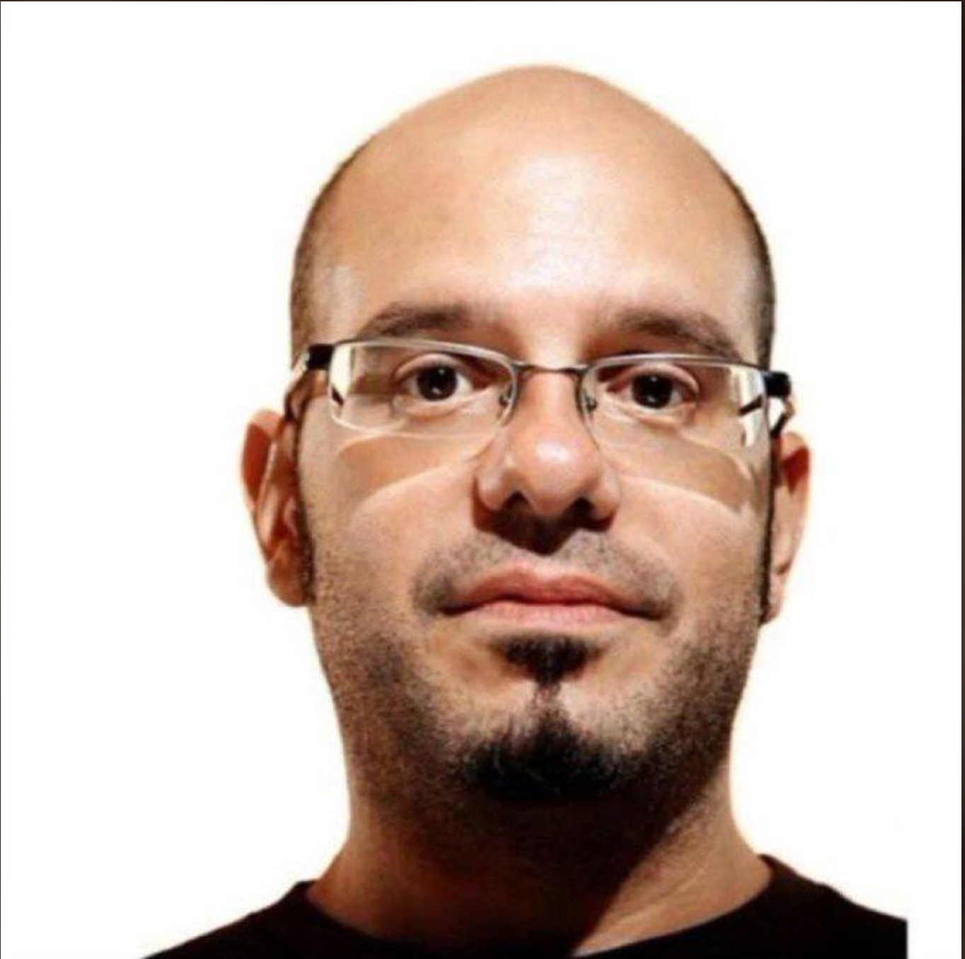 The image features a man with a bald head and glasses, wearing a dark shirt. His expression is neutral, possibly contemplative, suggesting a deep thought or focus. The background is plain white, which adds emphasis to his features and demeanor, creating a stark contrast that directs attention to his face. This minimalistic backdrop could imply a professional or artistic context, such as a portrait or a headshot for a publication. The lack of distractions allows viewers to concentrate on his expression and the subtleties in his gaze. The overall vibe is serious yet approachable, hinting at a thoughtful personality.  

Humorously, one might imagine him as a wise sage, ready to dispense life advice while secretly harboring a passion for collecting rubber ducks. It's a juxtaposition that brings a light-hearted twist to an otherwise straightforward image.