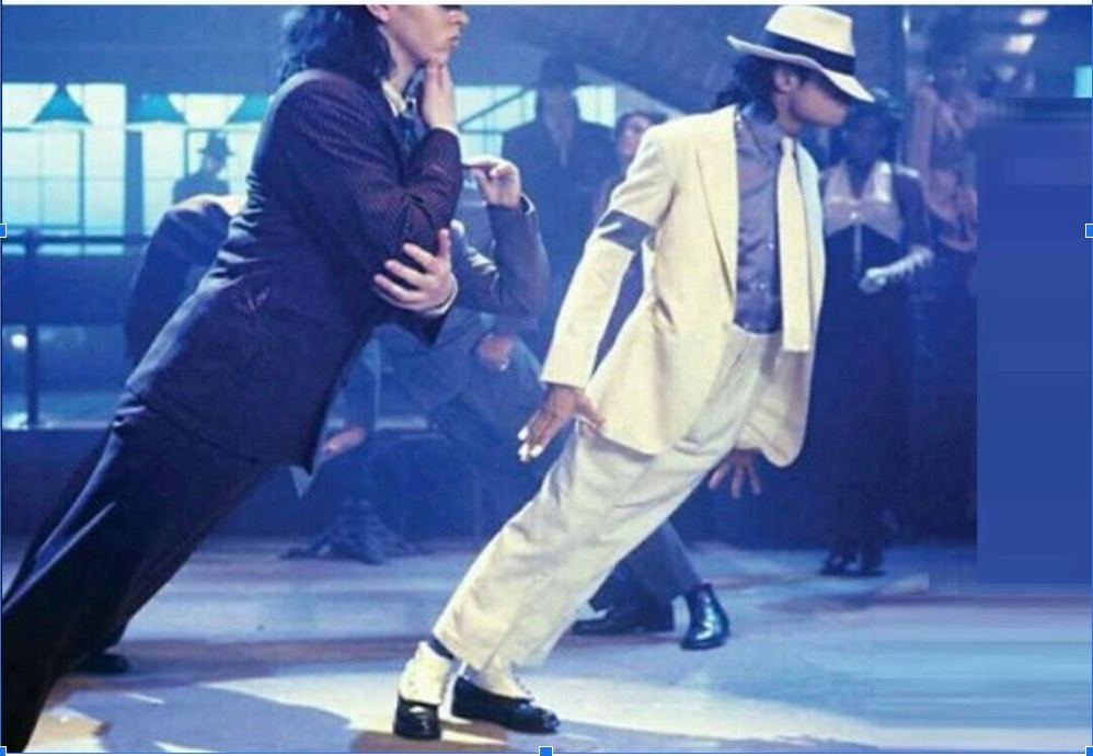 The image features Michael Jackson, the legendary musician, captured in the midst of his iconic dance moves, dressed in a sharp white suit and hat. His demeanor exudes confidence and charisma, embodying the essence of performance as he leans gracefully to one side, showcasing his signature style.
In the background, the dimly lit venue hints at a lively atmosphere, possibly a club or dance hall, filled with onlookers dressed in stylish attire, captivated by the performance. This context amplifies the moment, as it feels like a celebration of music and dance.
The juxtaposition of Jackson's crisp white outfit against the darker tones of the background accentuates his star power. The scene embodies the spirit of the 80s dance culture, where every move tells a story, and even a lean becomes a mesmerizing spectacle. It's as if the floor itself is in awe of his talent!