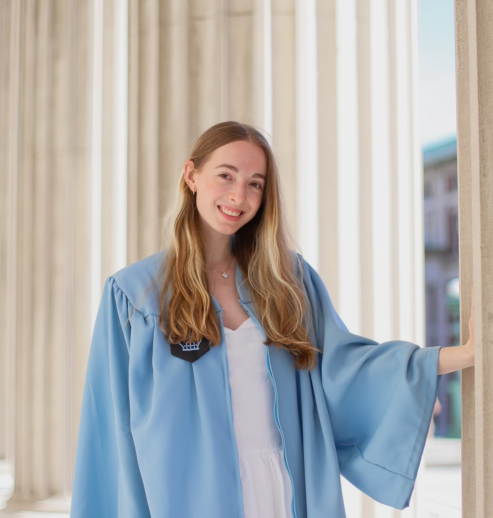 You're dressed like a grad but still a broke kid.