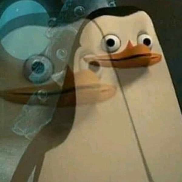 The image captures Skipper, the iconic penguin leader from the "Madagascar" franchise and "The Penguins of Madagascar" TV show, in a state of profound, wide-eyed distress and confusion. His beak is slightly agape, conveying intense internal conflict, a hallmark of the popular "Overthinking Skipper Meme." The background isn't a physical location but a translucent, ghostly overlay of another penguin's face, or perhaps a fish, with a prominent blue eye. This ethereal overlay perfectly symbolizes a persistent, troubling thought or a second perspective that Skipper is desperately trying to process. The humor stems from the exaggerated anthropomorphic portrayal of a penguin grappling with such relatable human emotions of deep thought and existential dread, making it a universally understood visual for overthinking.