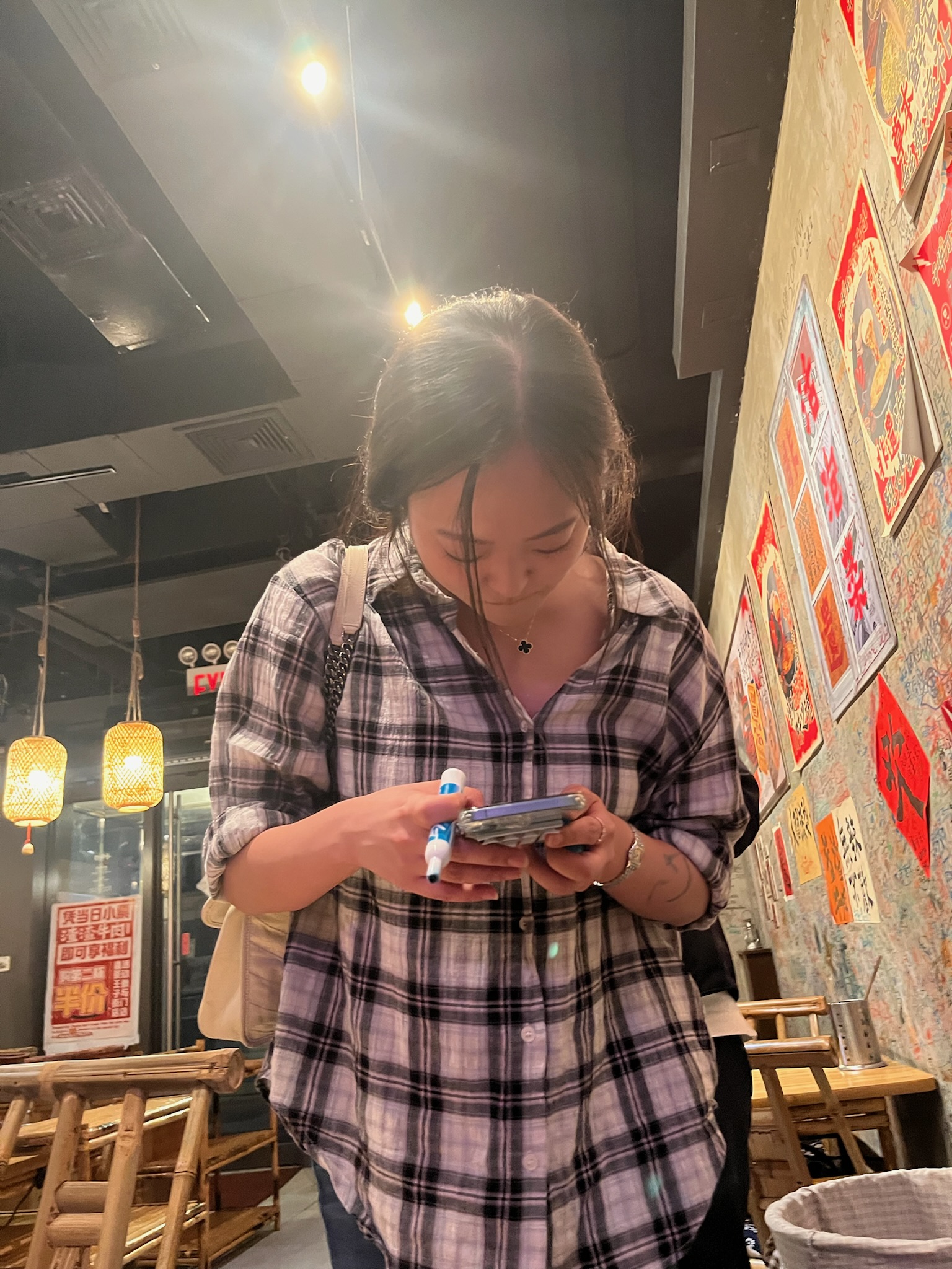 Plot twist: she's googling how to say "more WiFi" in Chinese.