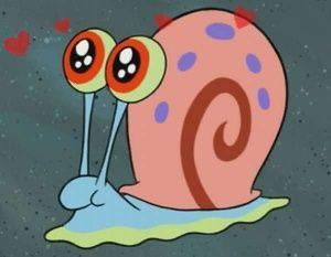 The image features Gary the Snail from the animated series "SpongeBob SquarePants." Gary is portrayed with large, expressive eyes that radiate affection, indicated by the hearts surrounding him. His demeanor is endearing and somewhat playful, suggesting a moment of love or admiration, possibly directed at SpongeBob or another character.
The background is simple, showcasing the underwater setting typical of the show, which enhances Gary's charming personality. The simplicity of the background allows the focus to remain on Gary's eyes and playful expression, emphasizing his character's innocence and charm. This scene captures a humorous and light-hearted moment, as the idea of a snail being smitten adds a whimsical touch to the underwater world, making it both relatable and entertaining.